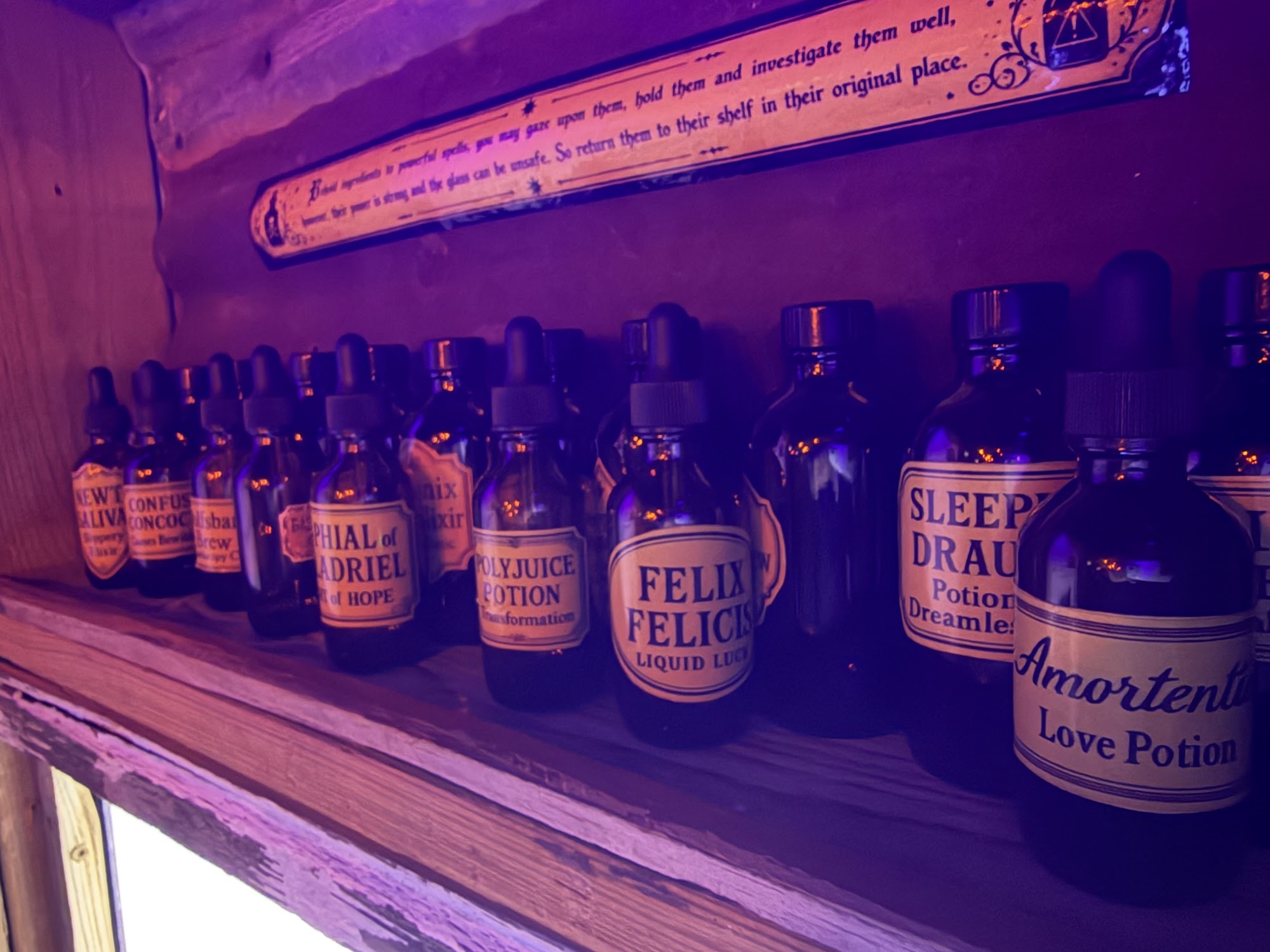 Real potion shelves inside Hexed Hollow at Lake Escape