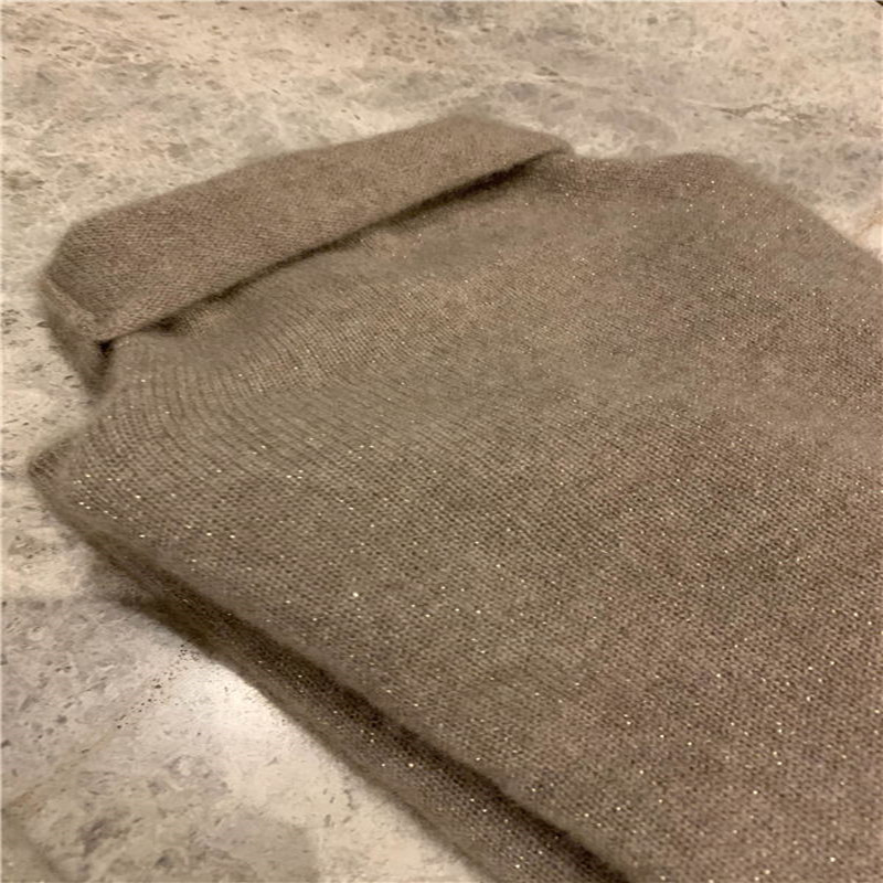 Women's wool sweater with stand-up collar and shine effect