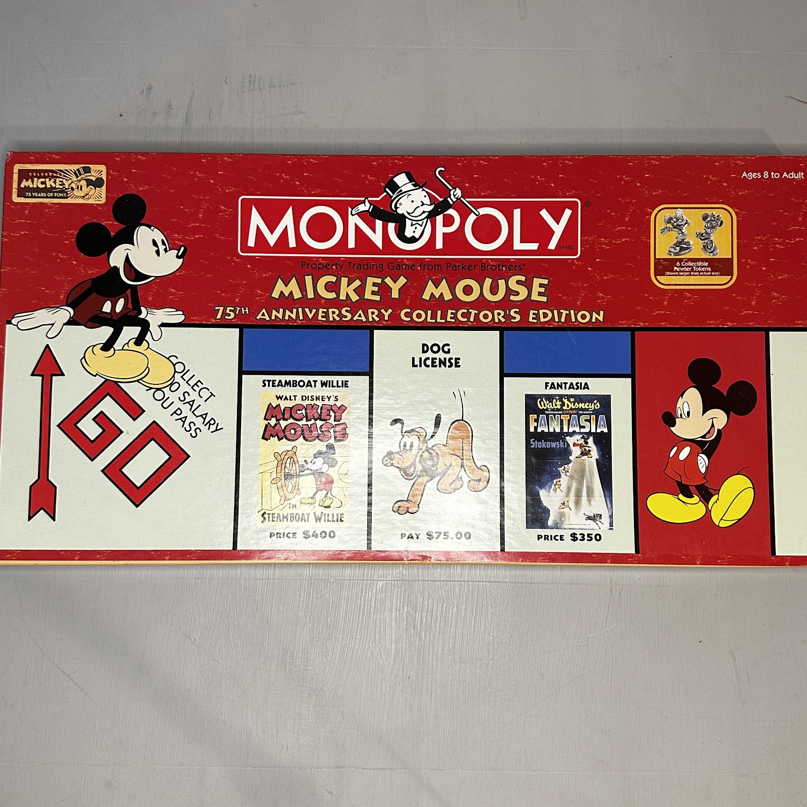 MONOPOLY Mickey Mouse 75th Anniversary Collector's Edition by Parker Brothers, 2004, with pewter tokens and Steamboat Willie and Fantasia artwork