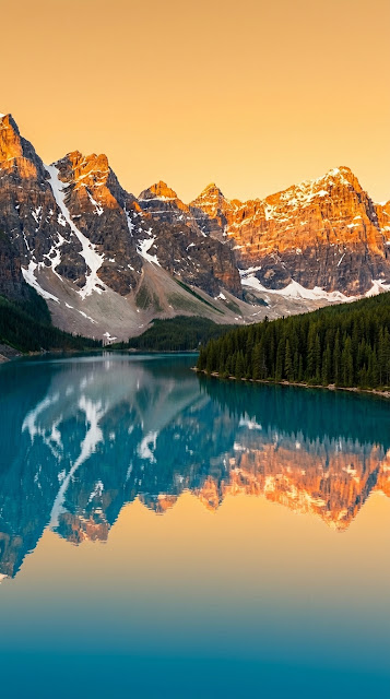 Stunning Lake Moraine with Turquoise Water and Golden Sunset Peaks - Free mobile Wallpaper