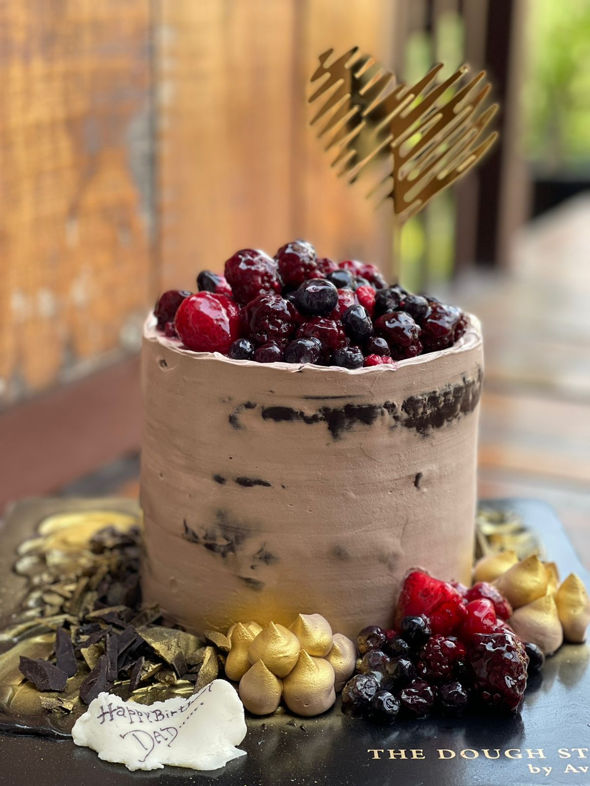 Rustic berry topped wedding cake