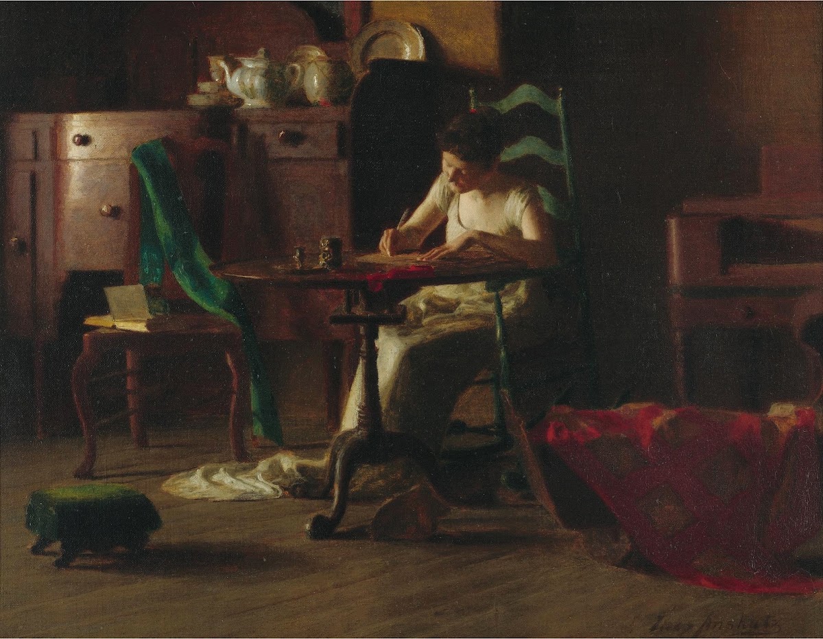 Woman writting on a table