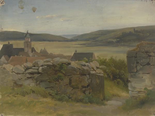 Kleines Dorf mit Blick auf Wiese