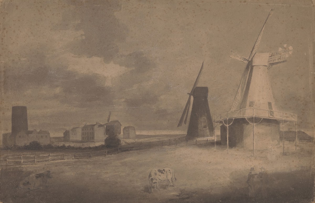 Two men conversing in a field windmills buildings and a body of water beyond 180