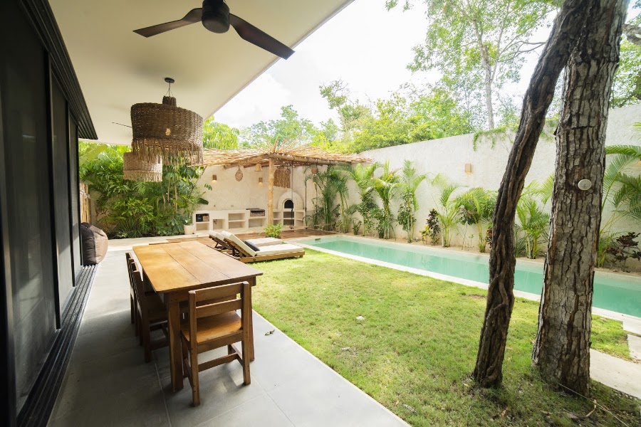 Covered terrace and tropical planting at Casa Saraguato