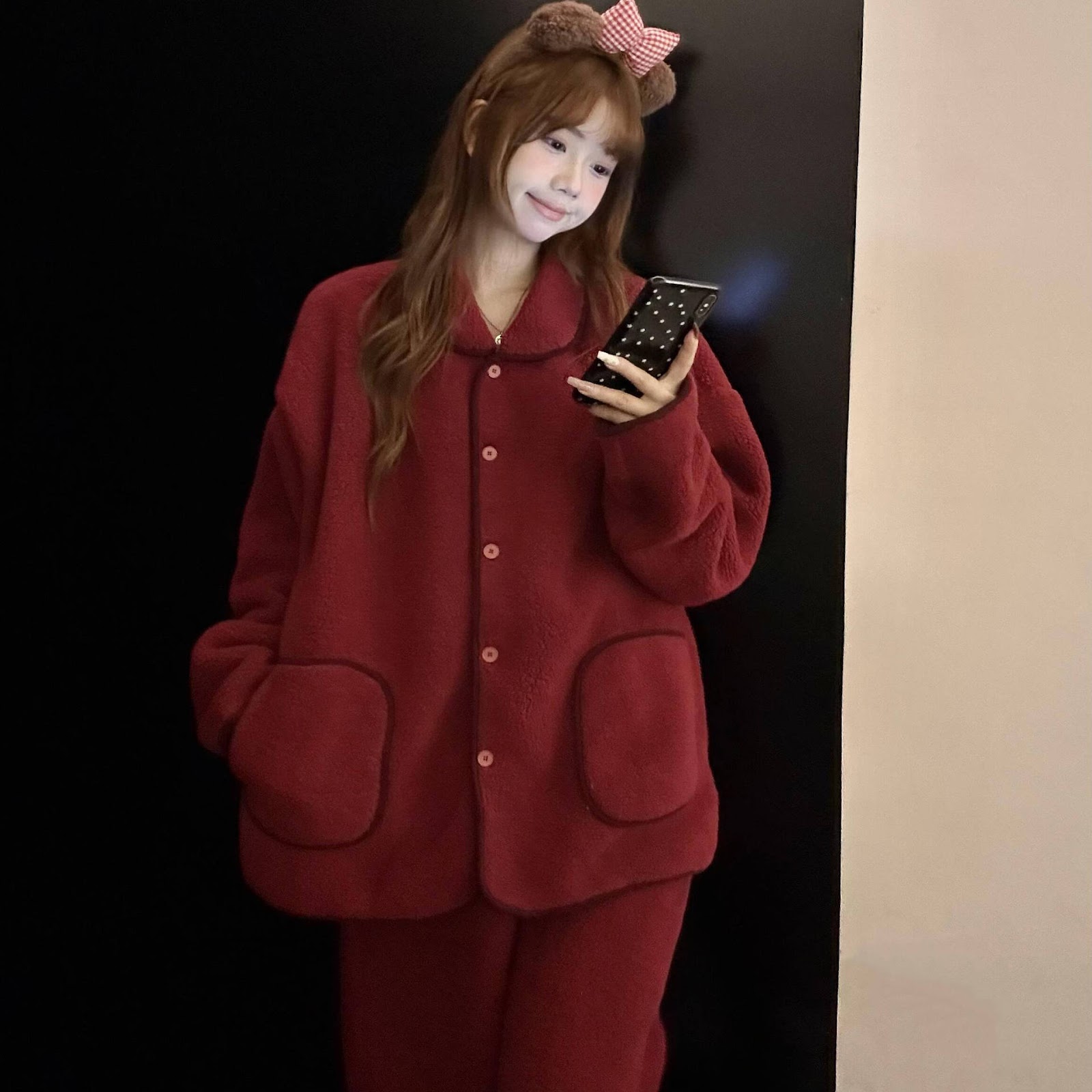 Women's onesie in red, padded, for the Christmas season