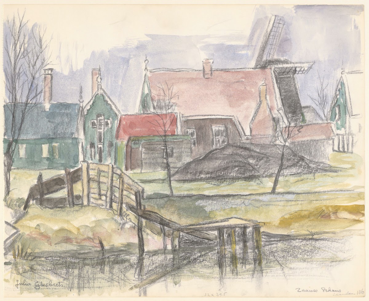 Huizen aan de Zaanse Schans rechts op de achtergrond een molen