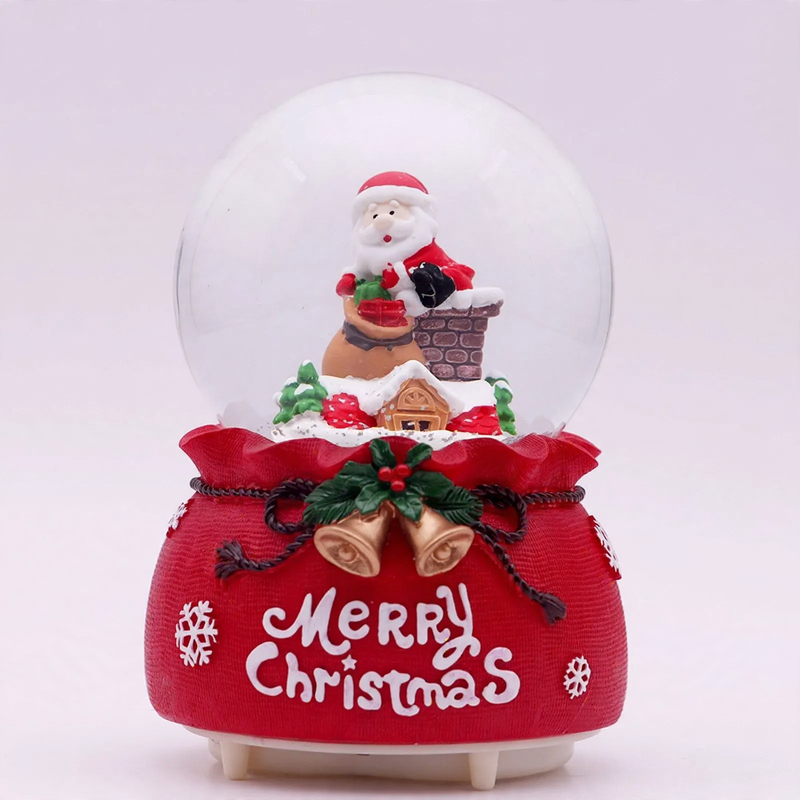 Christmas music box with glass globe and snow effect