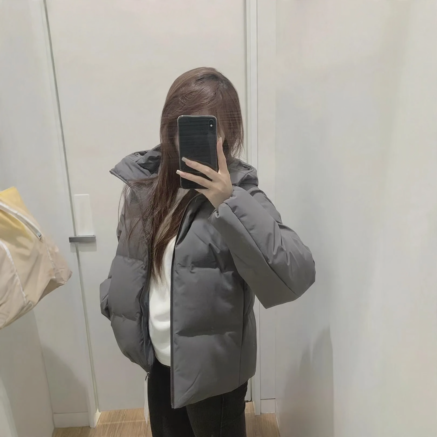 Padded women's winter jacket with hood