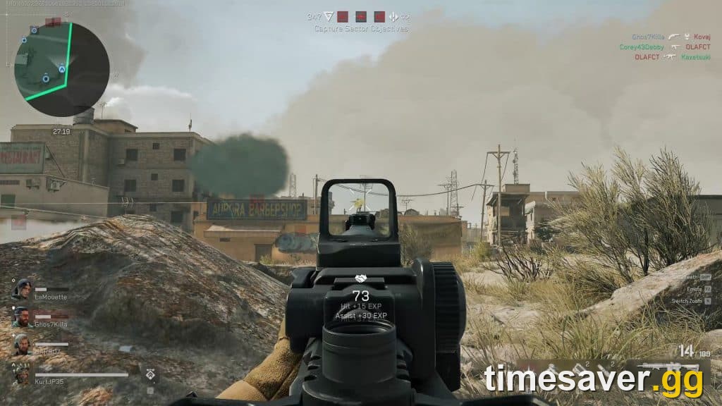 Delta Force first-person gameplay aiming an assault rifle down a dusty settlement lane