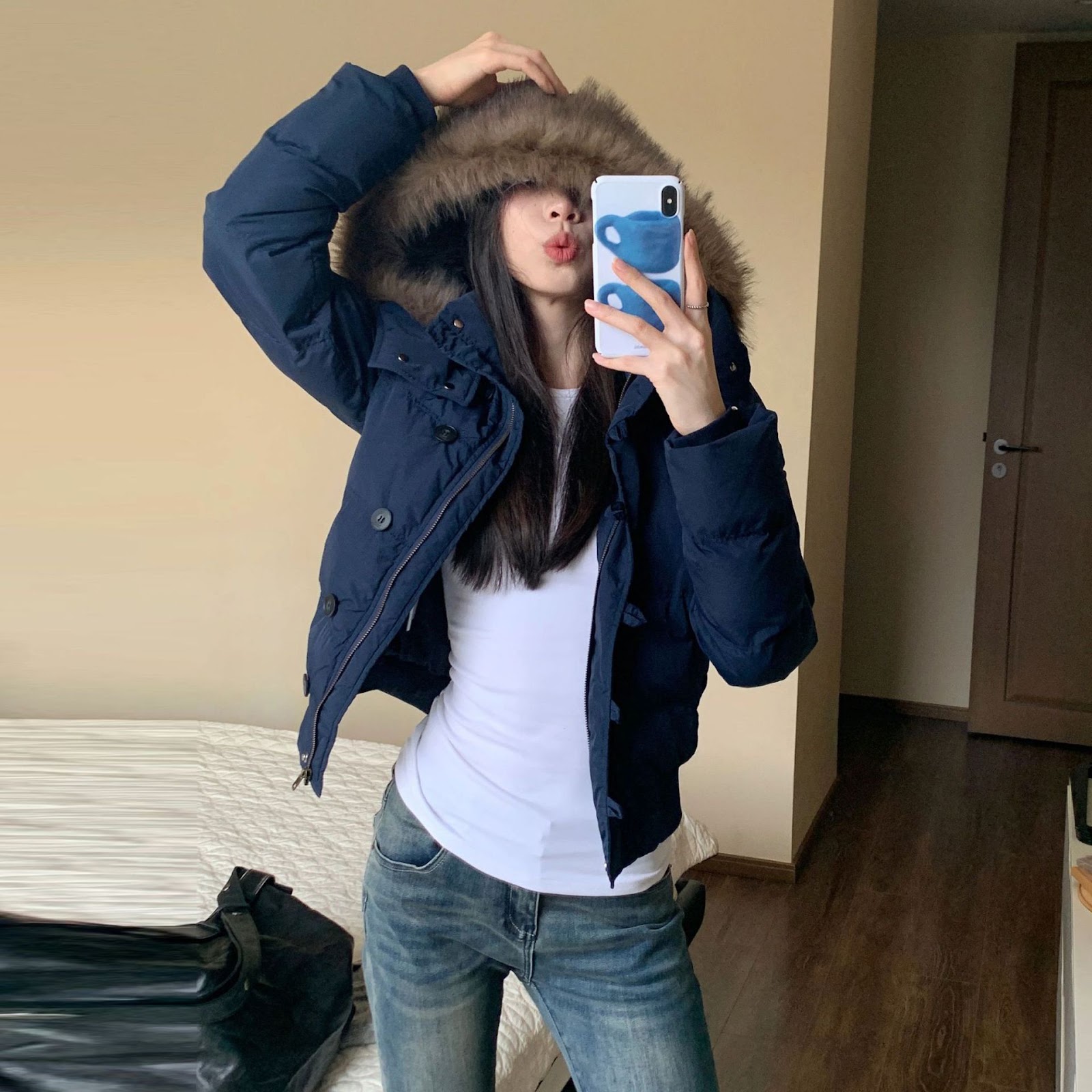 Short women's winter jacket with large collar
