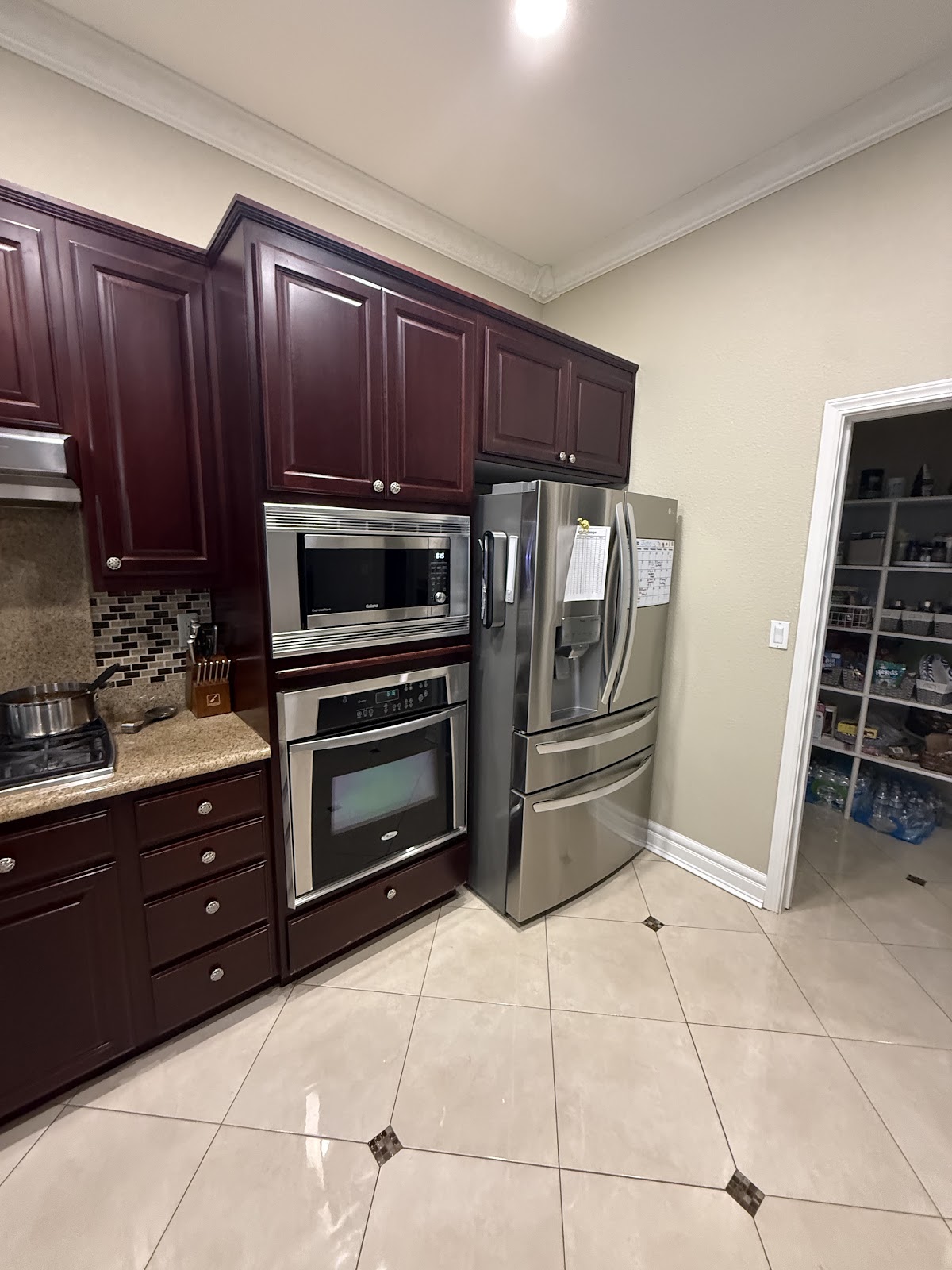 Upper kitchen cabinets with crown molding