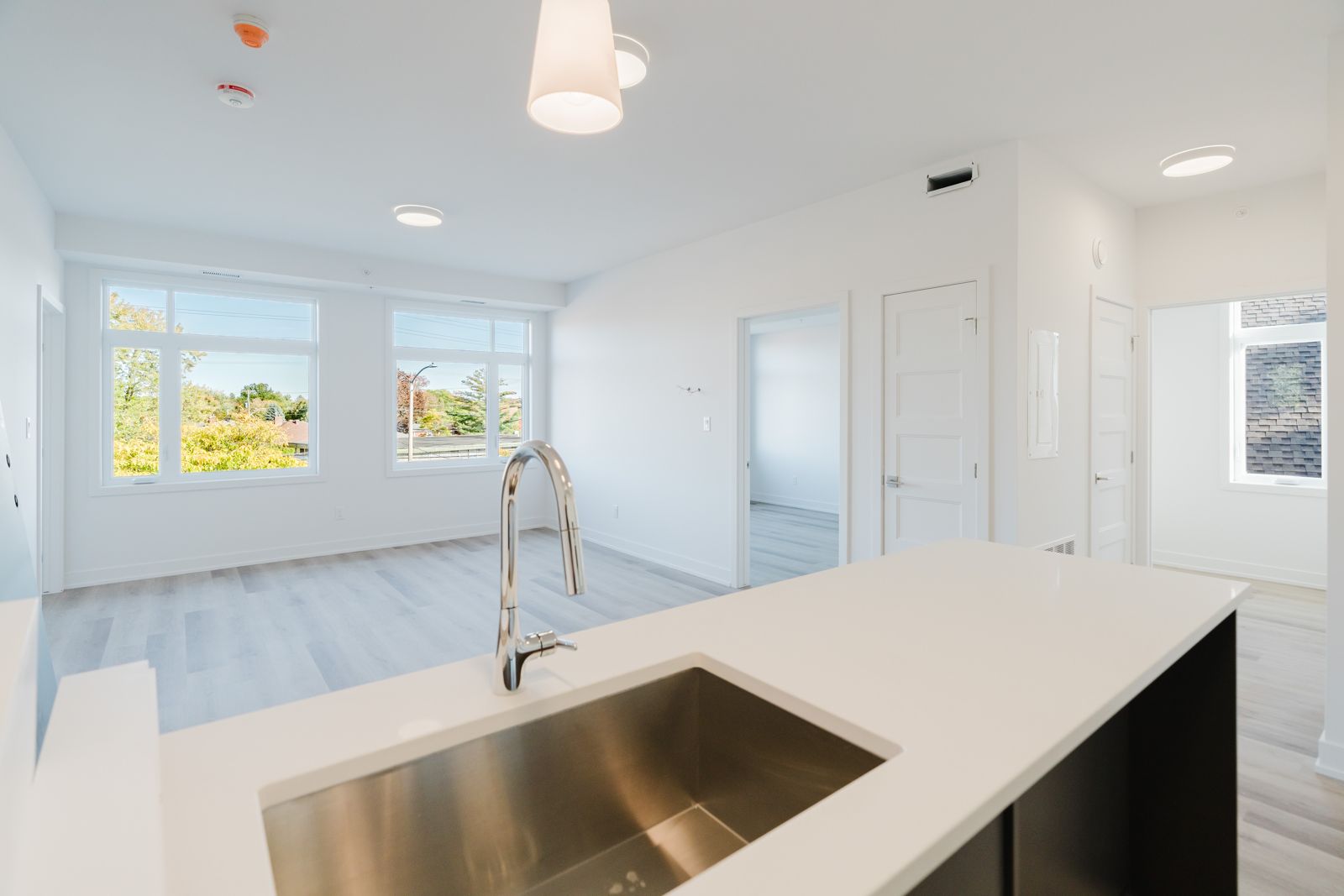 Kitchen island with sink in a new Ottawa rental unit