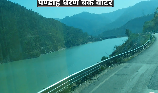 अ