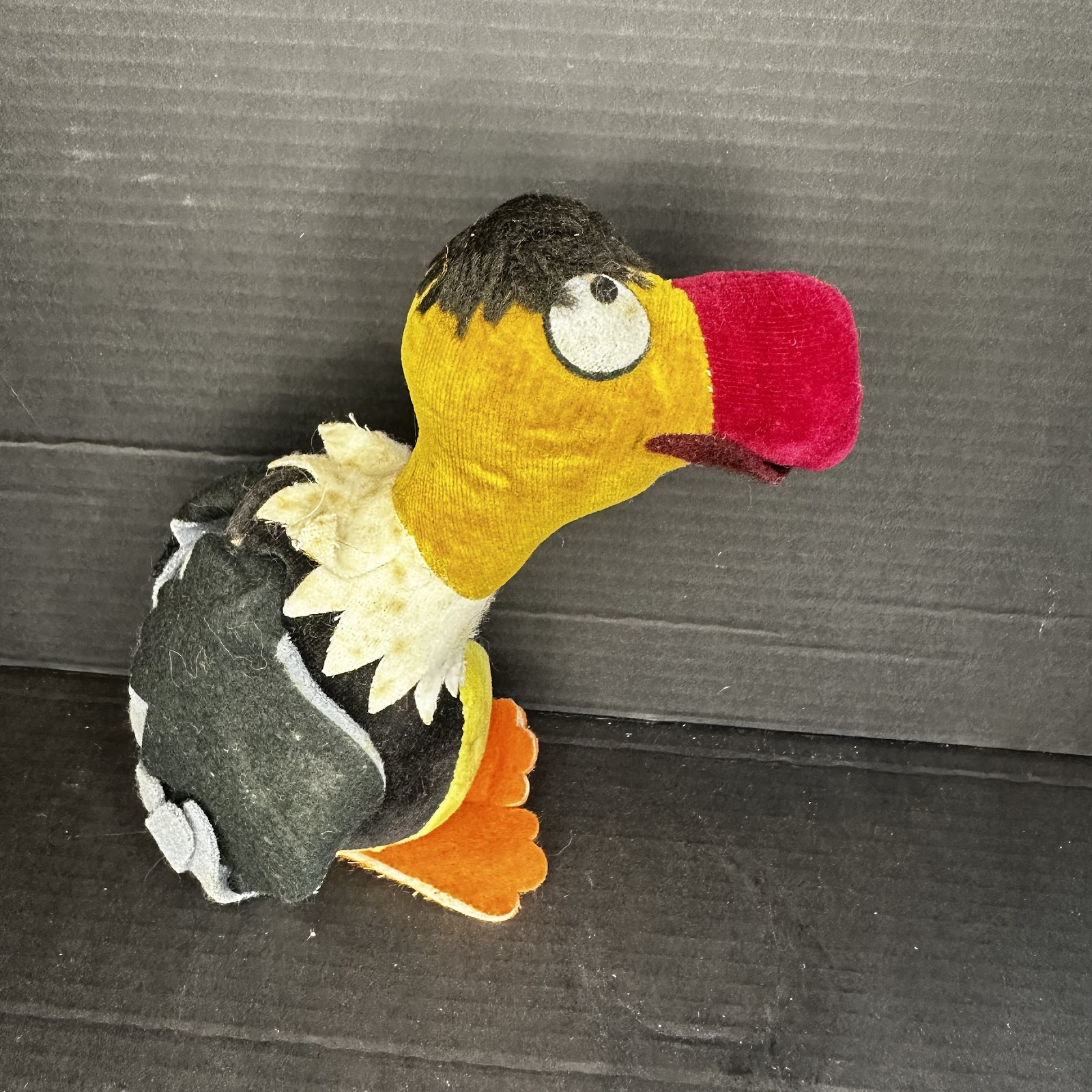 Vintage felt and velveteen vulture character figure from Disney's The Sword in the Stone, circa 1965–1975