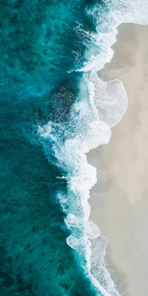 Ocean Surf On Sandy Shore Full HD iPhone Wallpaper Background