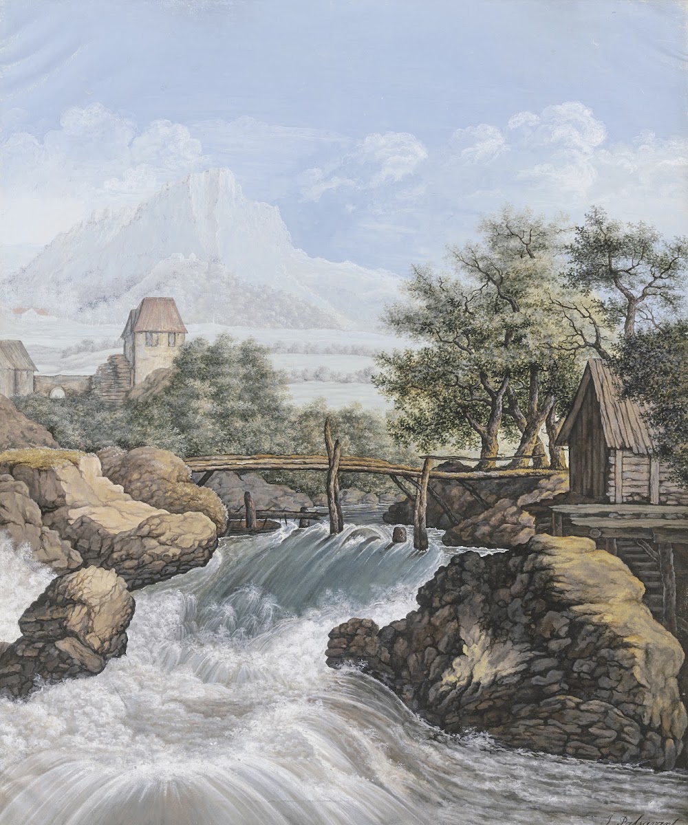 Ein reißender Bach mit einer Brücke und Blick in ein Tal