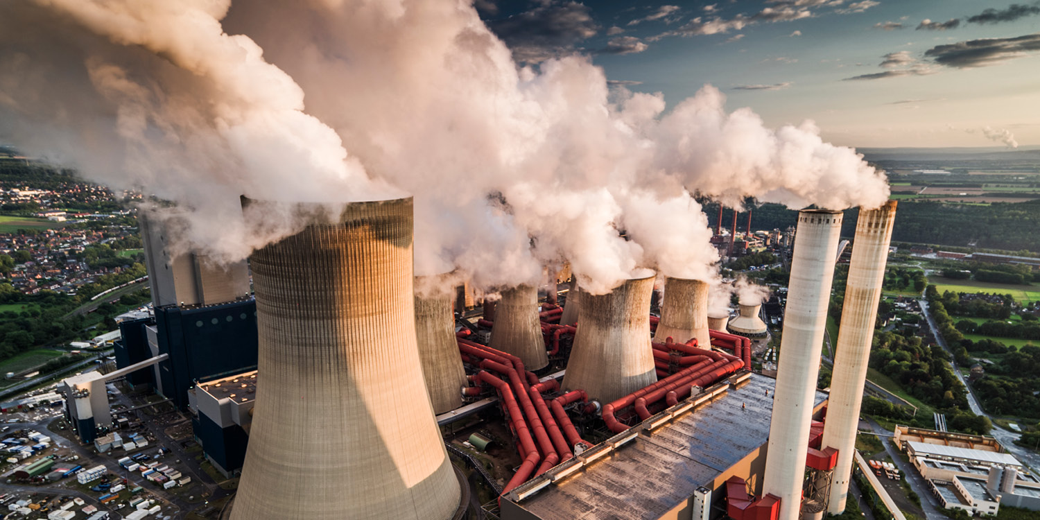 Coal Power Plant Pumping Out Smokes from Exhaust Pipes Green House Gas. GHG, Green house gas, Global warming gas, climate change gas. CarbonEthics Indonesia