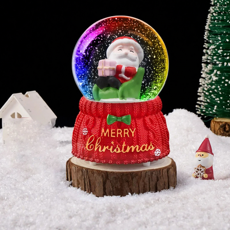 Weihnachtliche Schneekugel mit Licht und Musik