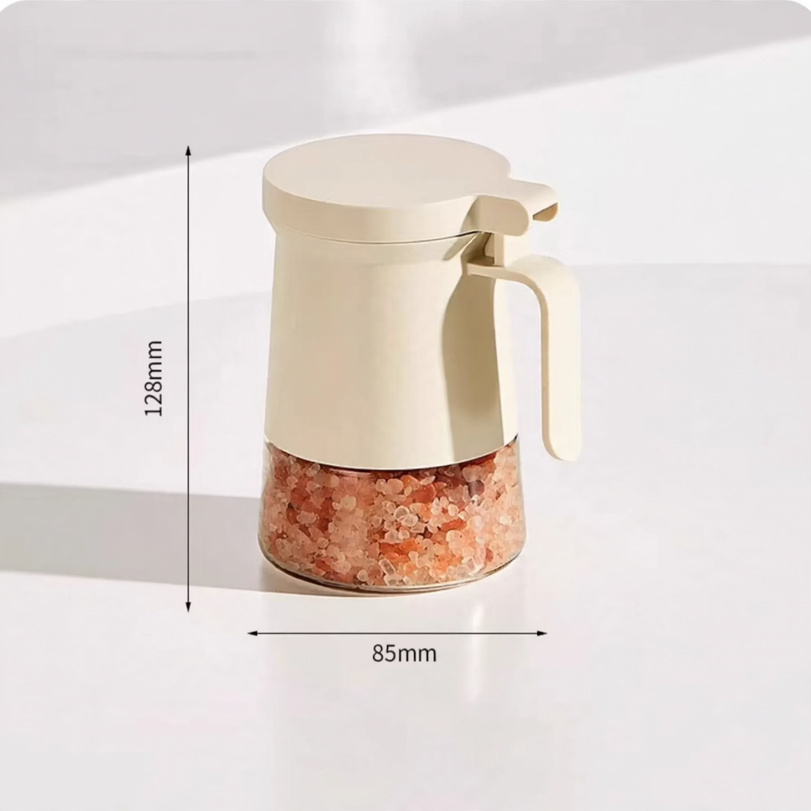 Versiegelter Gewürzbehälter aus Glas mit Löffel