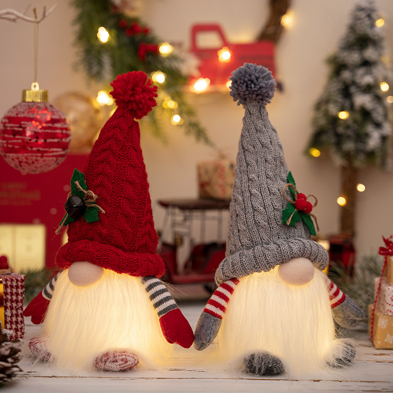 Illuminated Christmas gnome figures with knitted hats