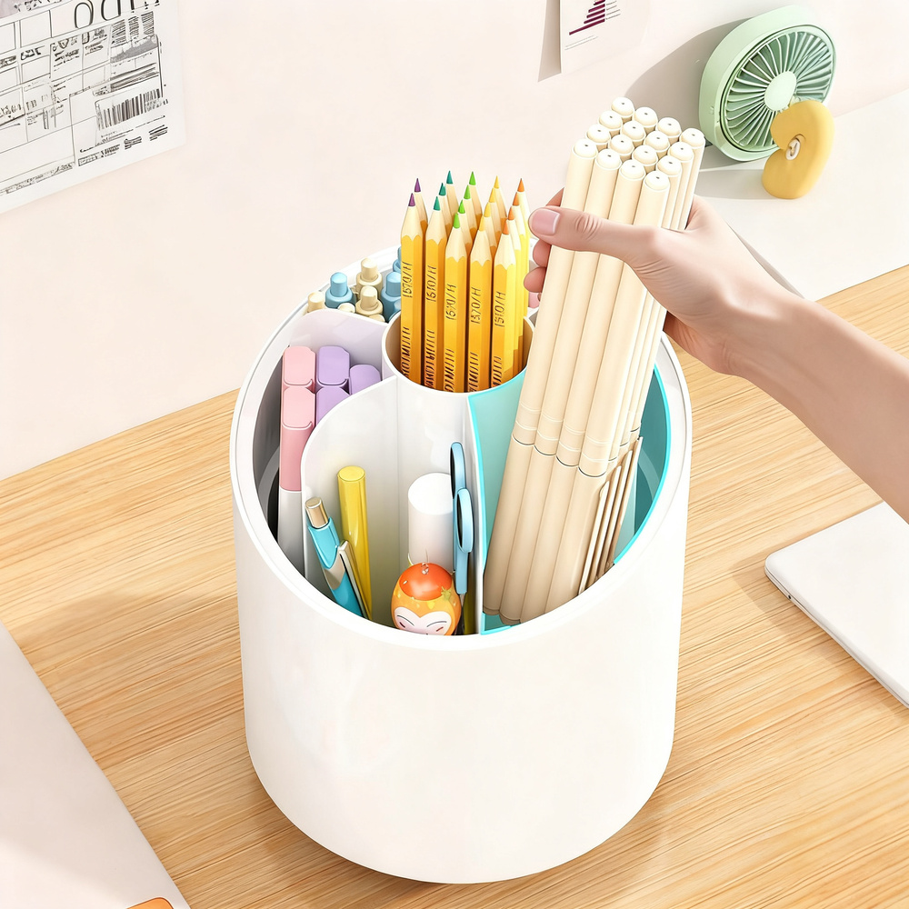 Rotatable pen holder with compartments