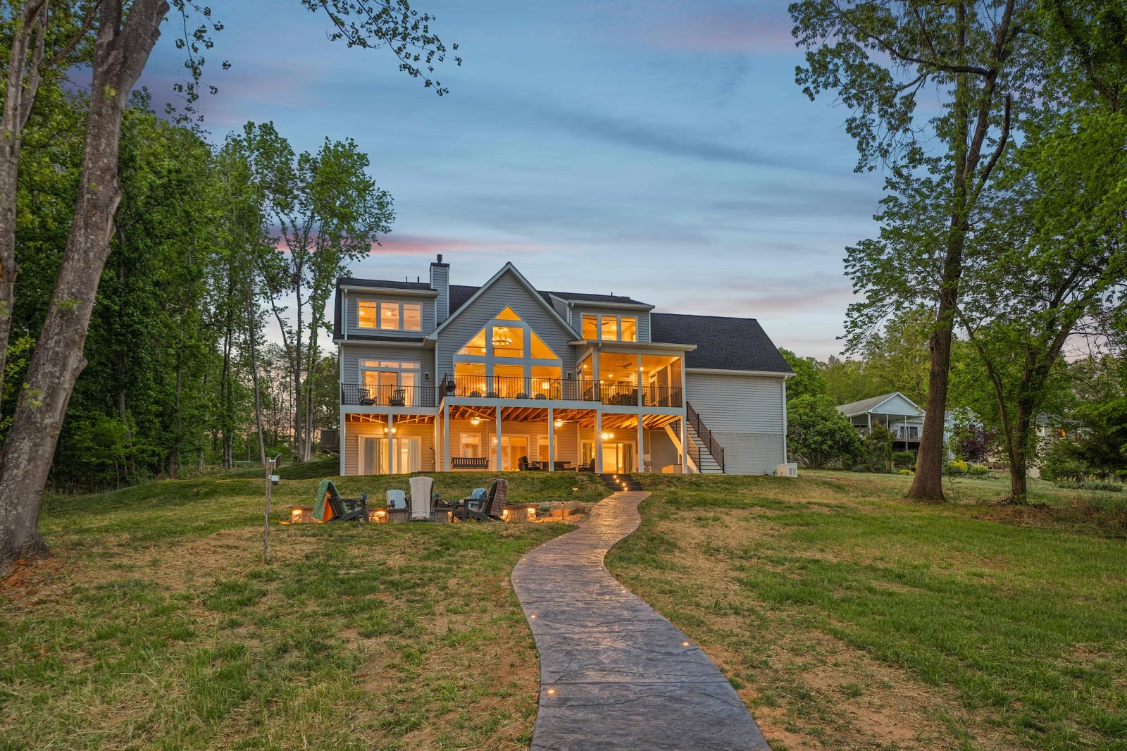 Property exterior glowing at dusk