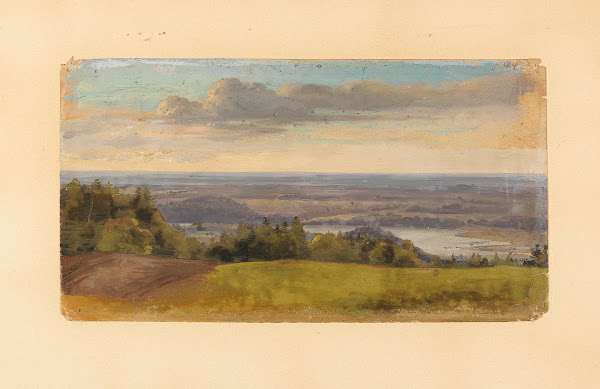 Weiter Blick in sommerliche Hügellandschaft