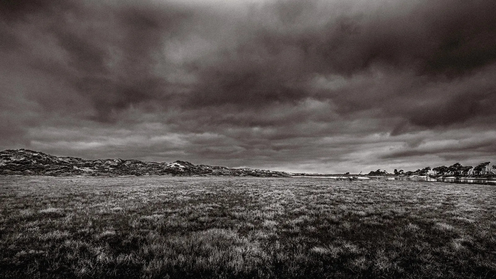 Dramatic Sky Over Open Field - Monochrome Landscape Photography 5K Wallpaper (5971x3359)