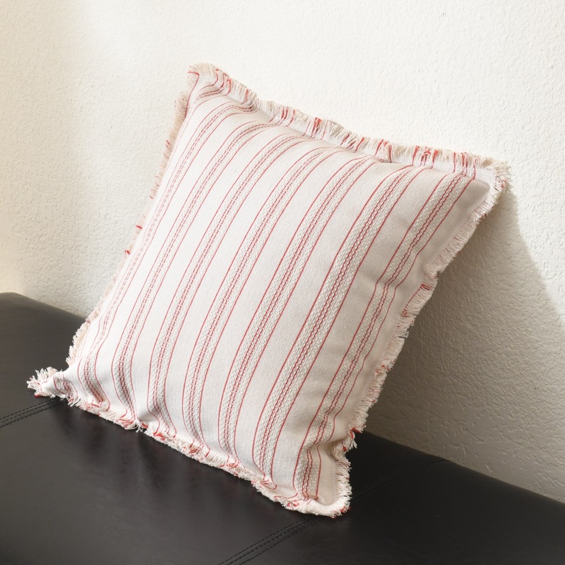 Square decorative cushion with stripe pattern