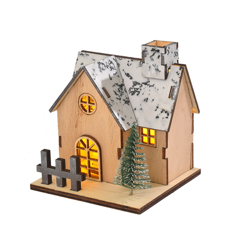 Illuminated wooden Christmas house with LED