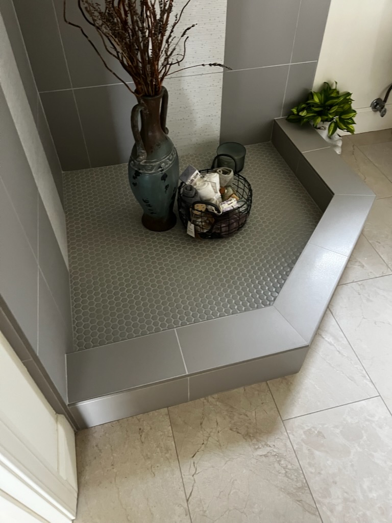 Tiled corner shower base