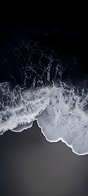 Aerial View of White Ocean Foam on Dark Black Sand Beach - Free mobile Wallpaper