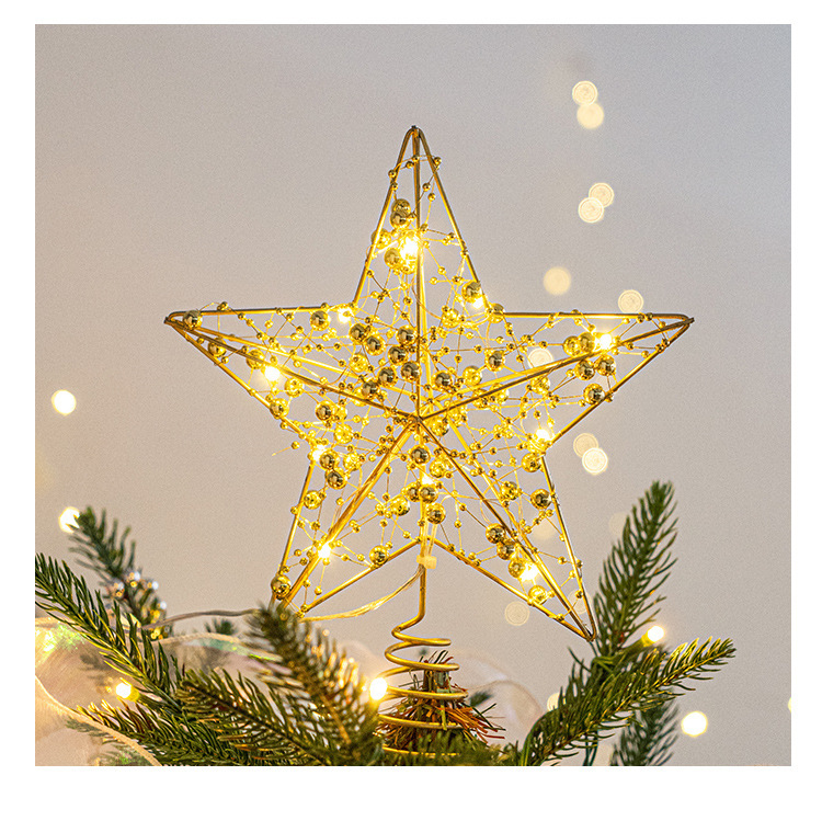 Illuminated Christmas tree star made of iron