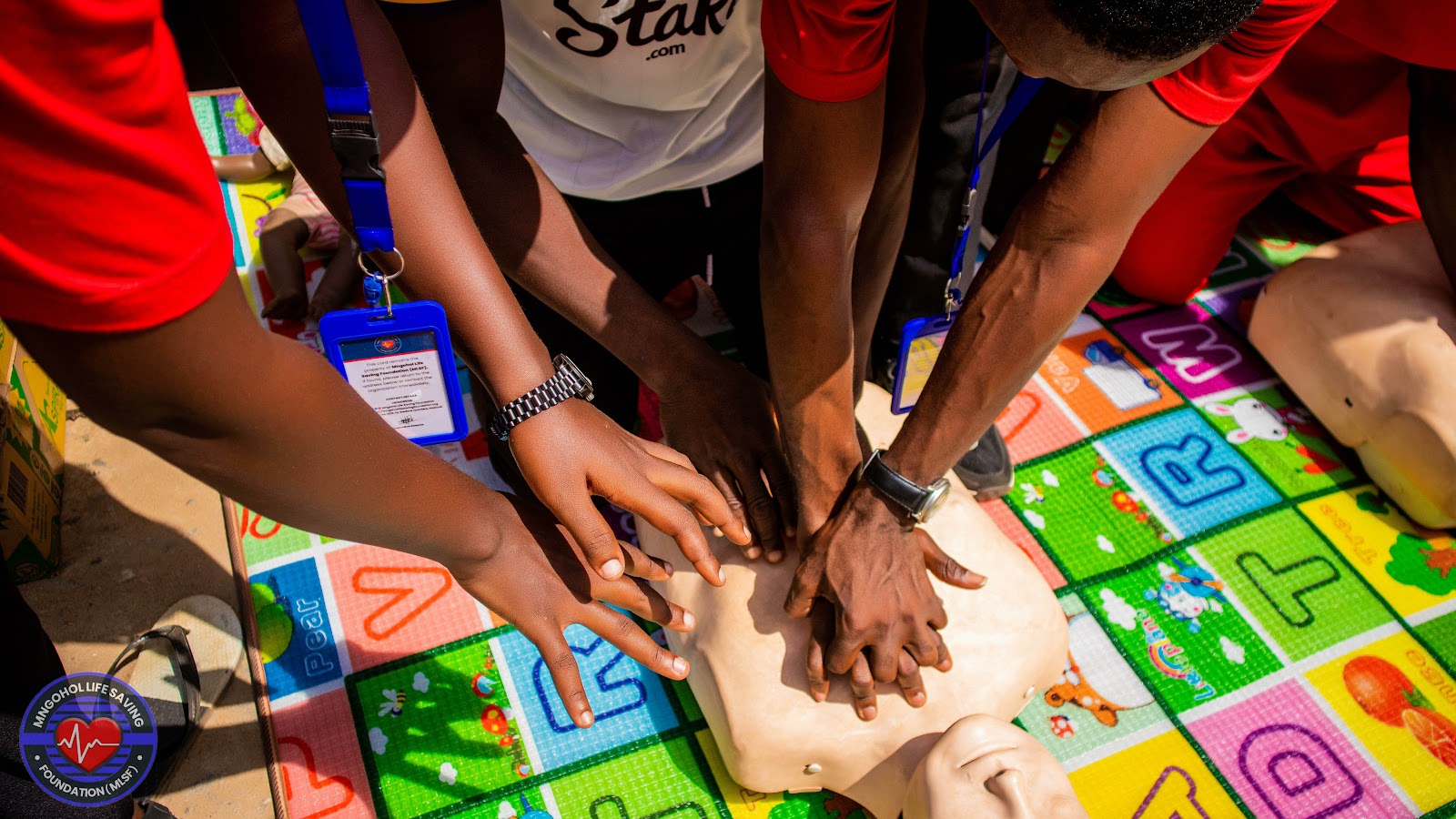 Participants receiving hands-on Basic Life Support and emergency response training