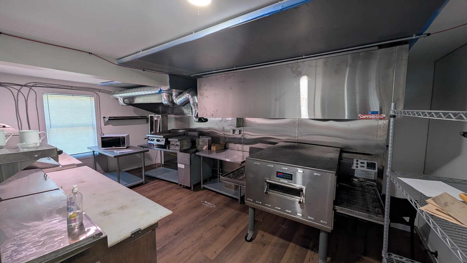 Commercial kitchen with pizza oven