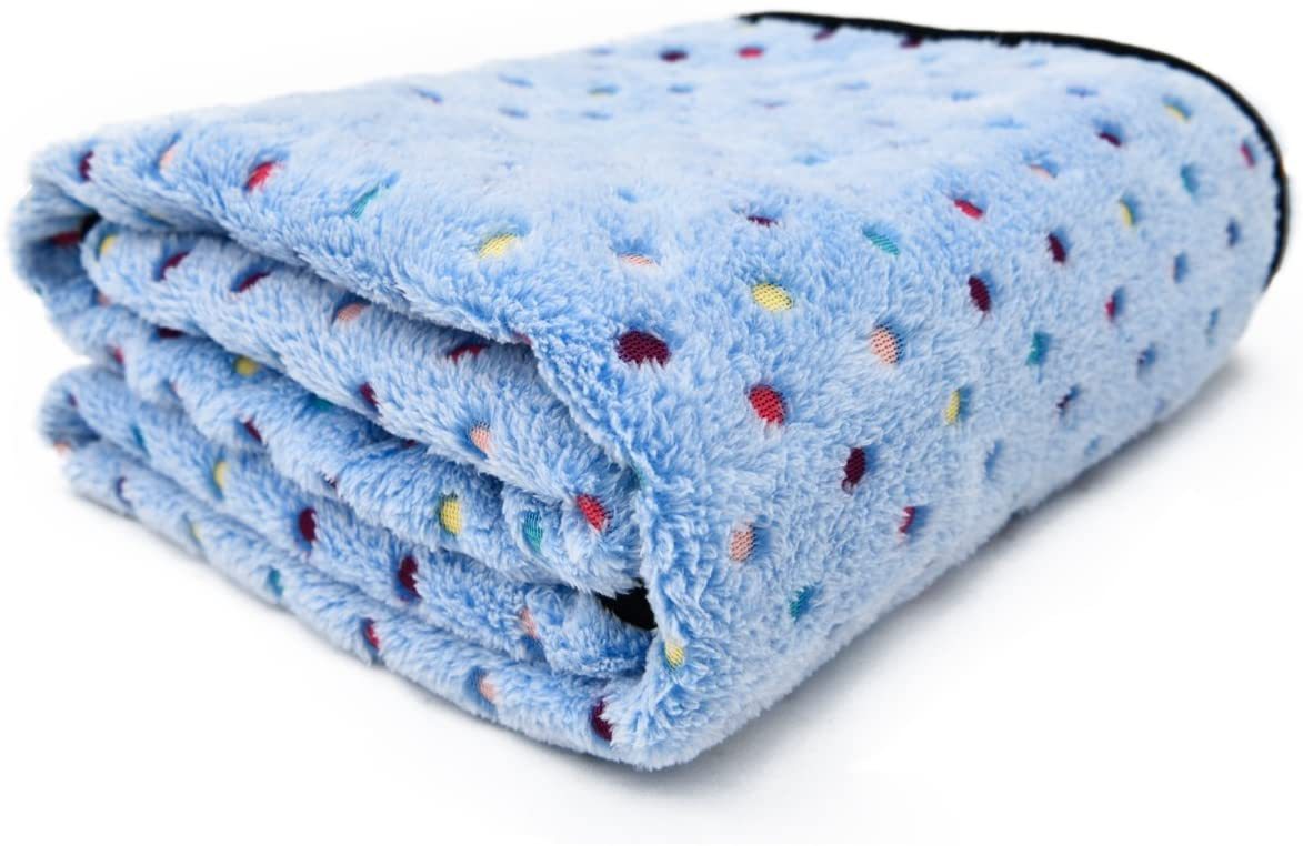 Fleece pet mat with paw and bone pattern