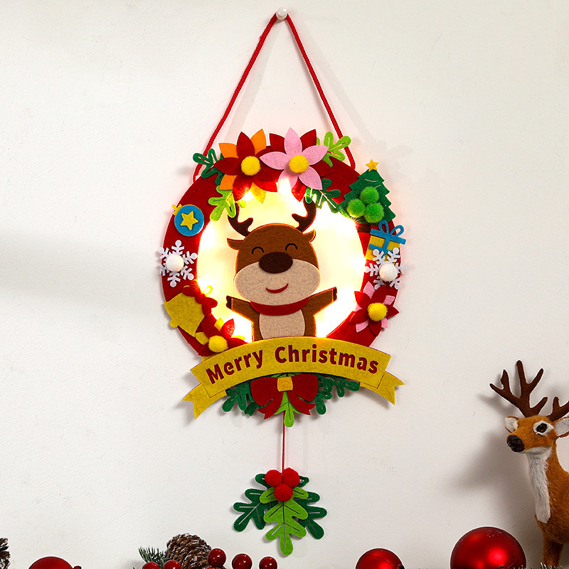 Christmas wreath made of fabric with LED lighting