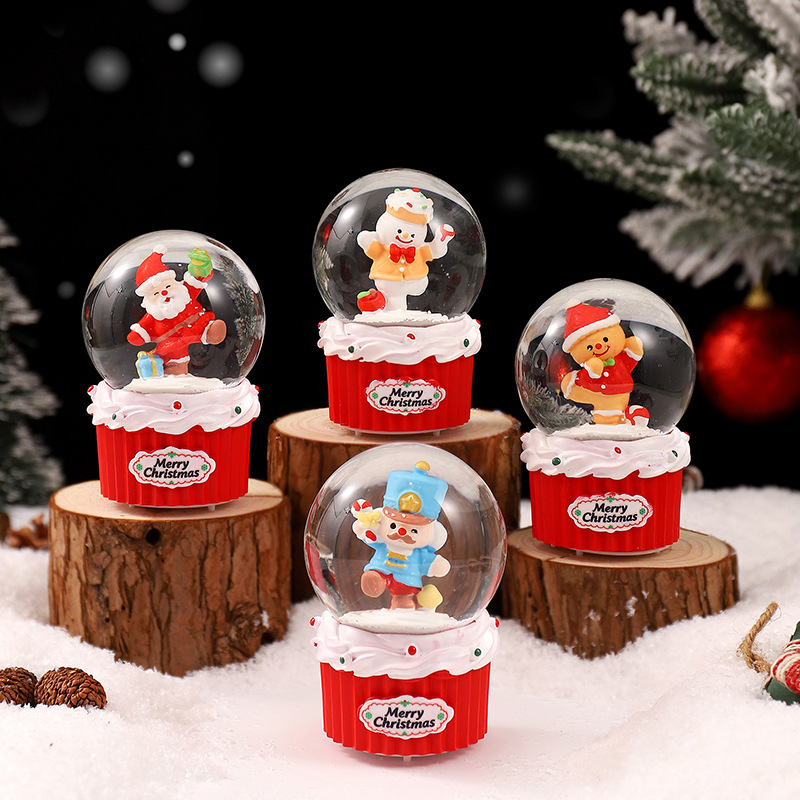 Weihnachtliche Schneekugel mit Beleuchtung und Glitzereffekt