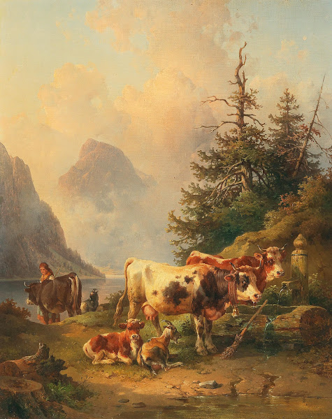 Herd of animals with shepherdess on the lakeside