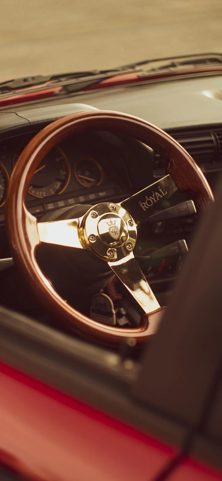 Golden Spoke Wood Steering Wheel - Automotive Photography 4K iPhone Wallpaper (2392x5182)
