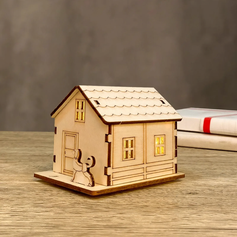 DIY Christmas house made of lime wood with lighting