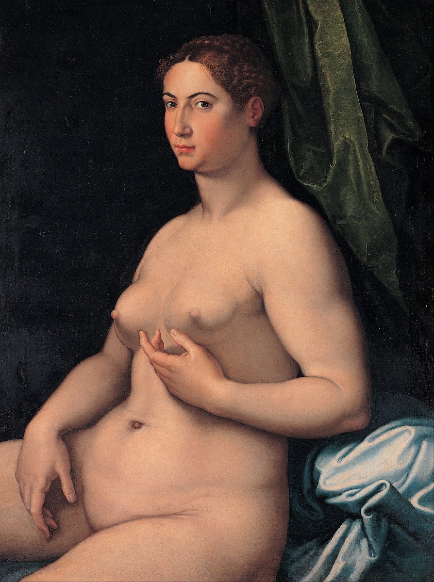 A seated female