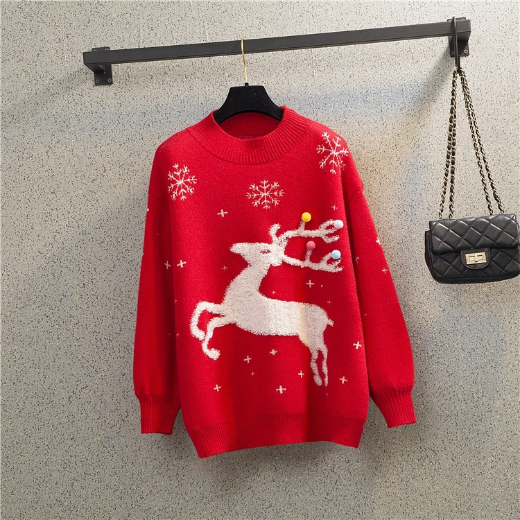 Loose women's Christmas sweater with reindeer motif