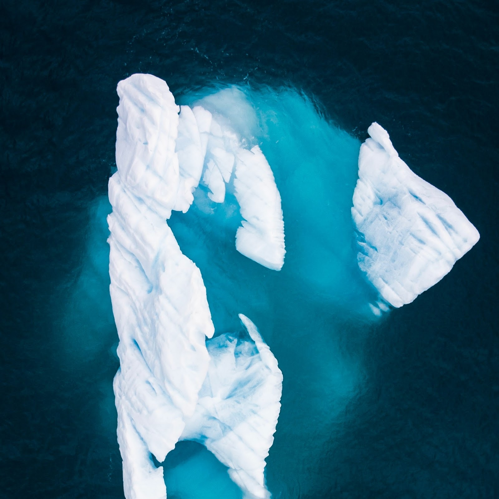Download Aerial View of Floating Iceberg 2K iPhone