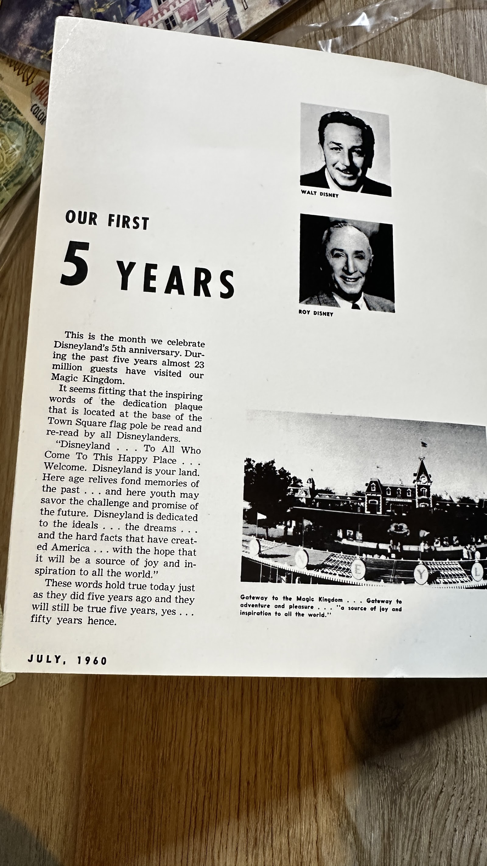 1960 Disneyland fifth anniversary commemorative page showing side-by-side portraits of Walt and Roy Disney, the Dedication Speech text, and the Main Street Train Station floral Mickey portrait