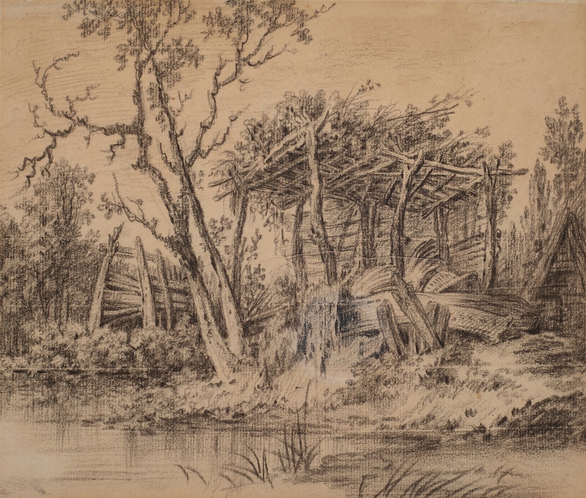 A wooden shelter in picturesque decay by a river
