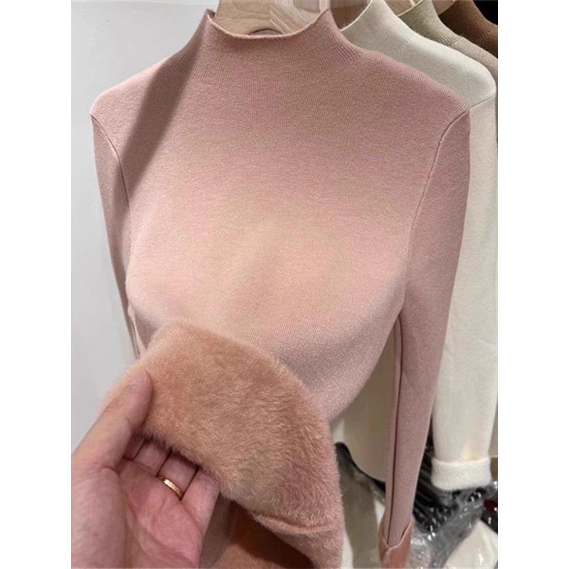 Women's knitted sweater with standing collar and fleece lining