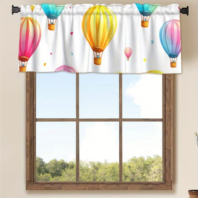 Window curtain with hot air balloon motif