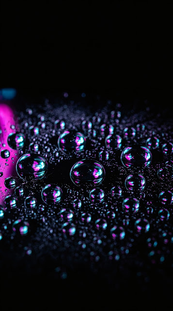Crystal clear water droplets on dark obsidian glass catching vibrant neon city bokeh reflections against pure black.